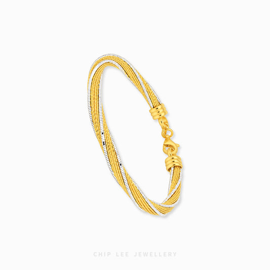 Two-Tone Flexi Italia Gold Bangle with an elegant textured design.
