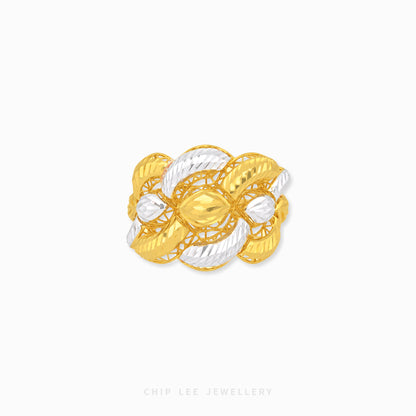 A two-tone gold and silver ring with a textured, knotted floral design, shown on a plain white background with a Chip Lee Jewellery watermark at the bottom.