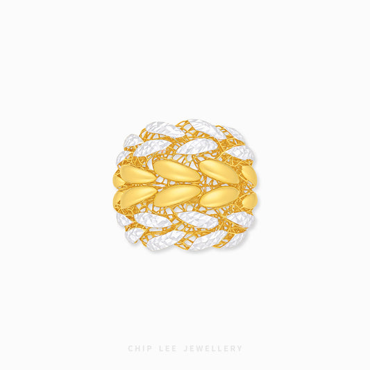 A gold and white textured woven ring by Chip Lee Jewellery, featuring smooth gold oval links interwoven with textured white links, shown on a light gray background.