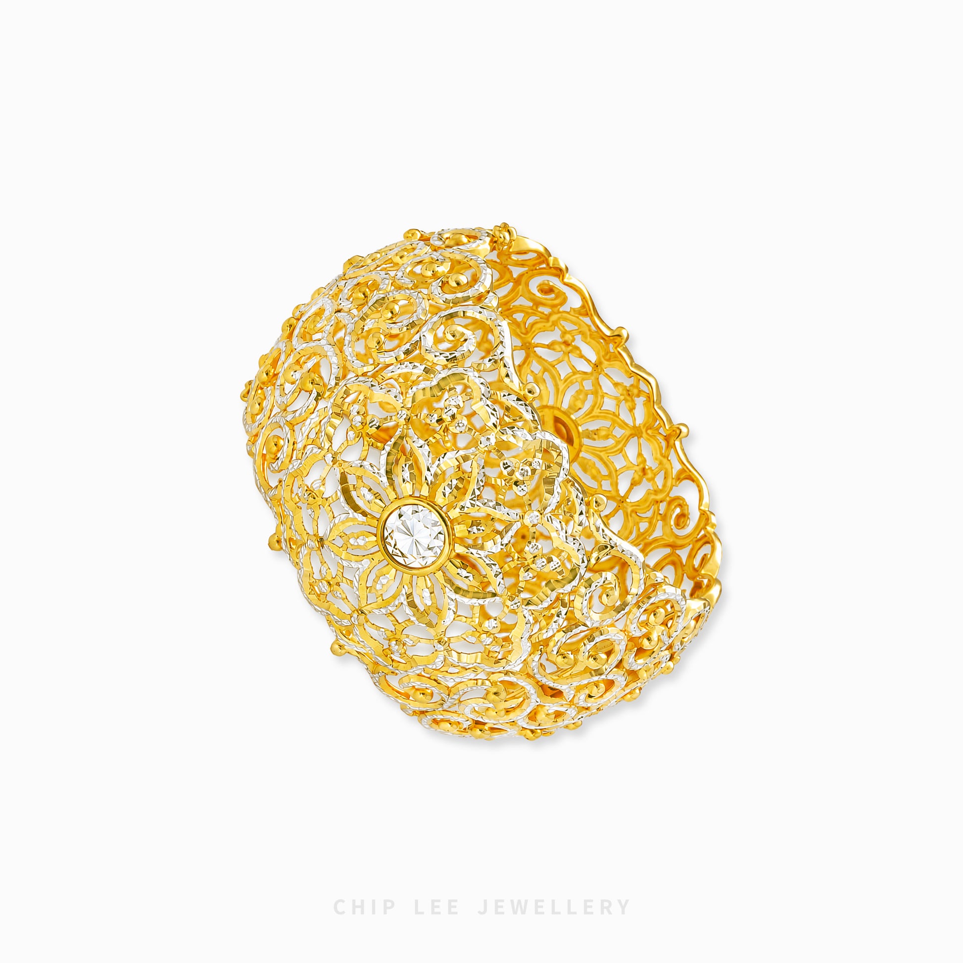 Duo Tone Floral Filigree Cuff Bangle featuring intricate floral openwork and contrasting two-tone detailing