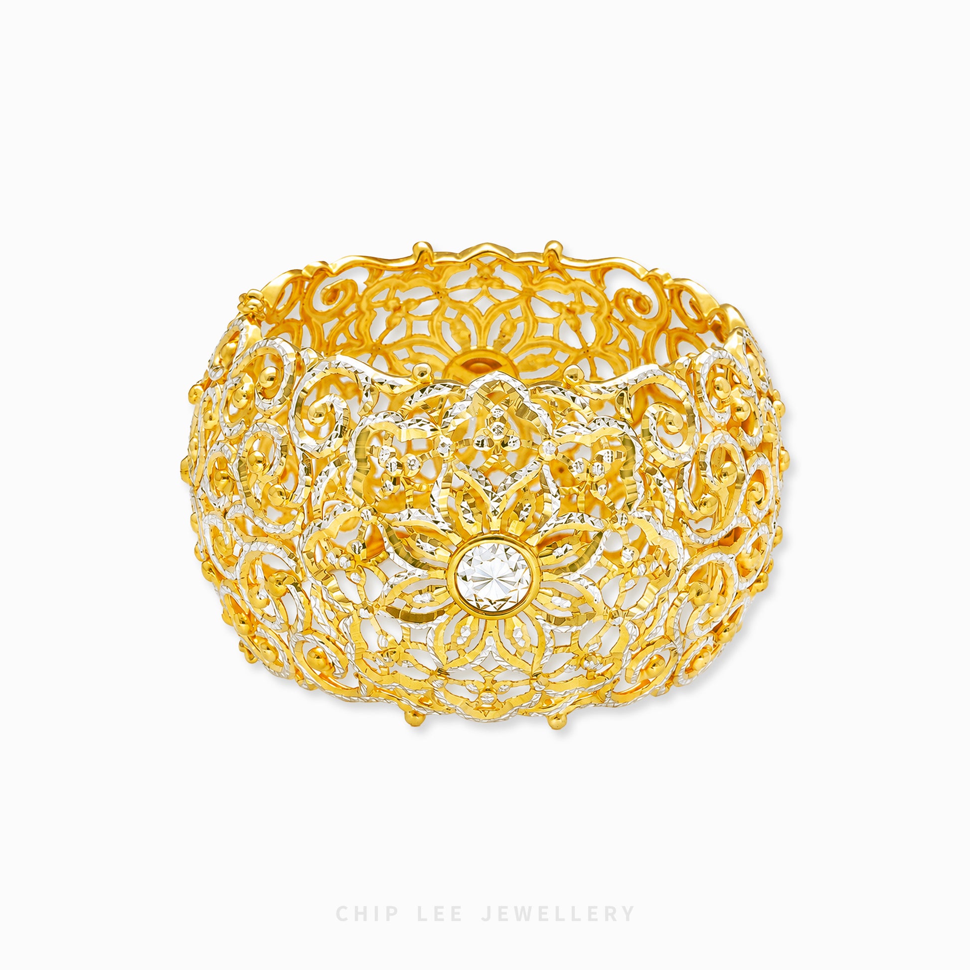 Duo Tone Floral Filigree Cuff Bangle featuring intricate floral openwork and contrasting two-tone detailing