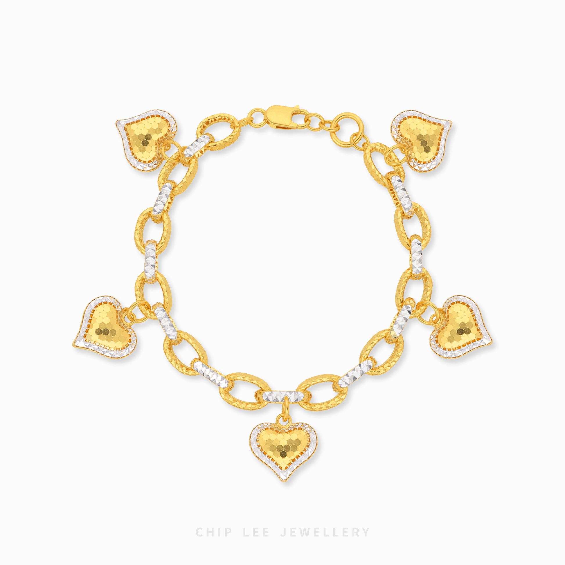 Gold bracelet with heart-shaped charms on a white background