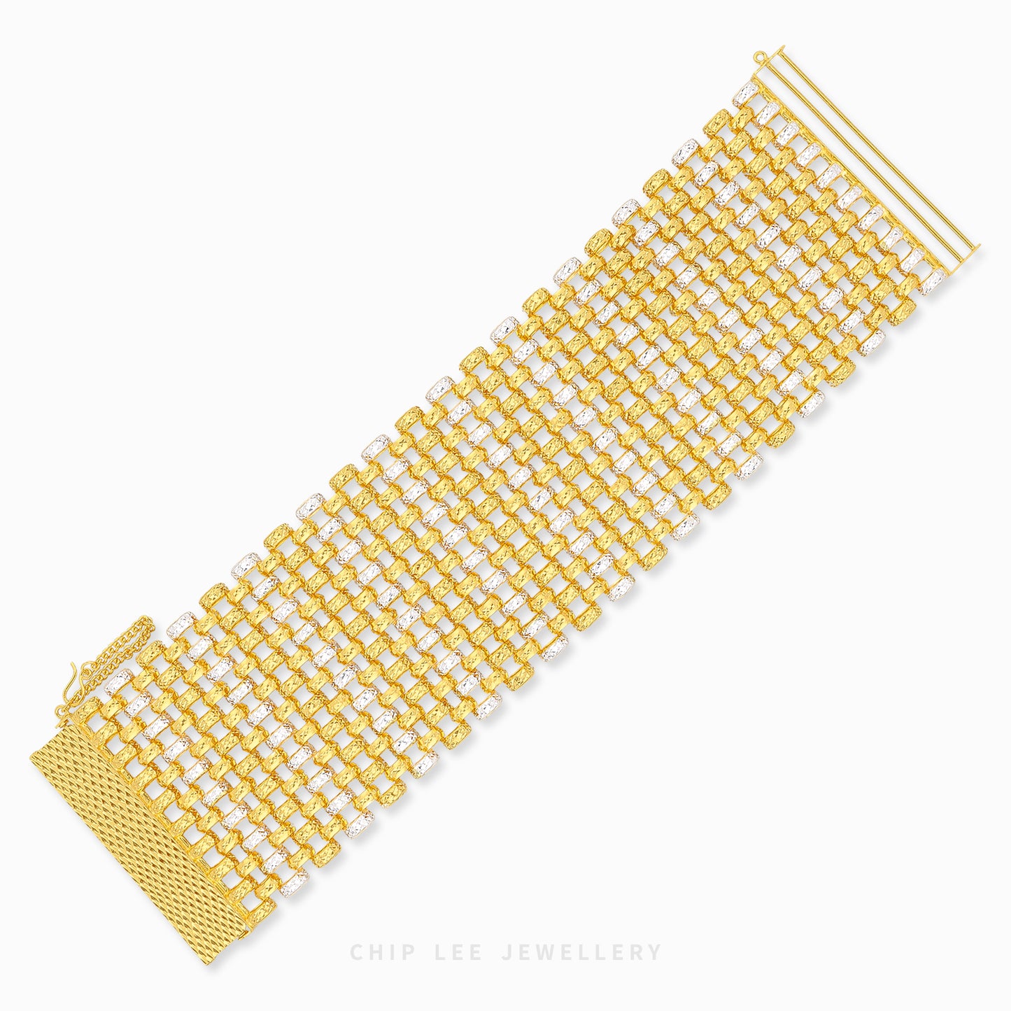 A bold play of contrast and texture, the Duo Tone Lattice Bracelet features an intricate woven lattice design in radiant yellow and white tones.