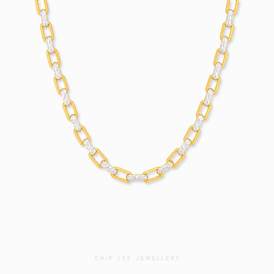 Mixed metal necklace with textured finish