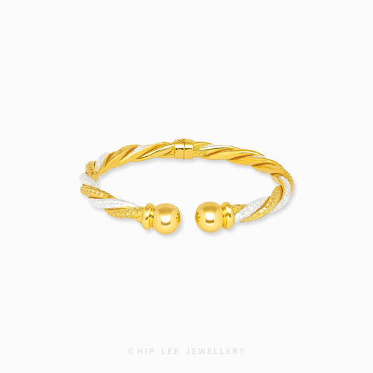 Duo Tone Spiral Cuff Bangle by Chip Lee Jewellery Singapore, sculpted 916 gold with matte and high-polish finishes, bold and elegant accessory
