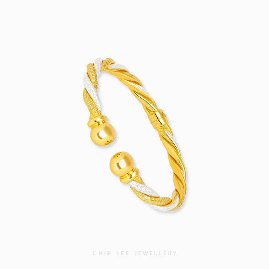 Duo Tone Spiral Cuff Bangle by Chip Lee Jewellery Singapore, sculpted 916 gold with matte and high-polish finishes, bold and elegant accessory