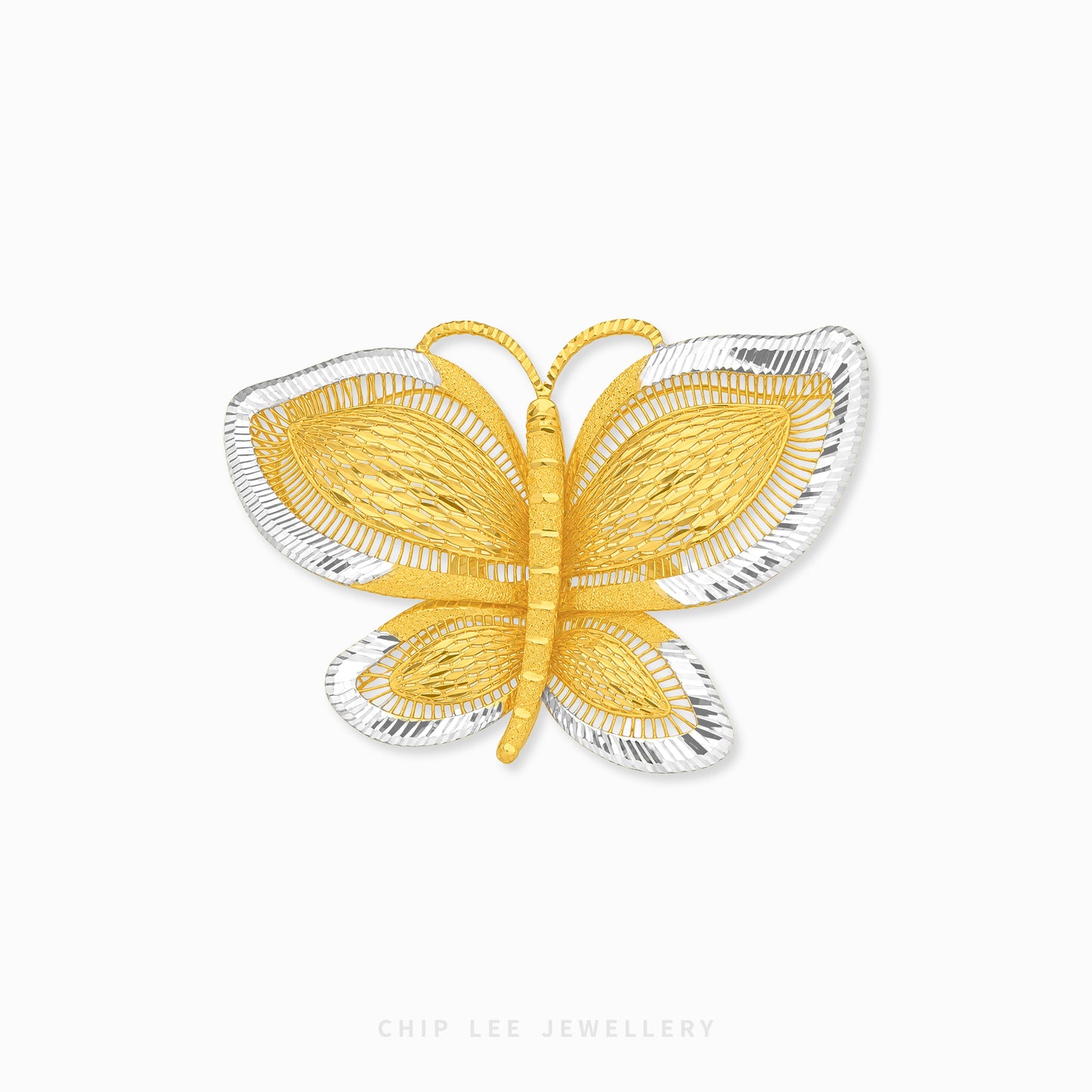 A butterfly-shaped ring by Chip Lee Jewellery, featuring textured yellow gold wings and body with silver-toned outer edges, set against a plain white background.