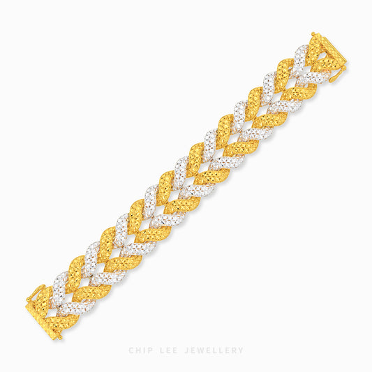 A two-tone braided bracelet with textured yellow gold and white diamond pavé sections, shown diagonally on a light gray background with a Chip Lee Jewellery watermark.