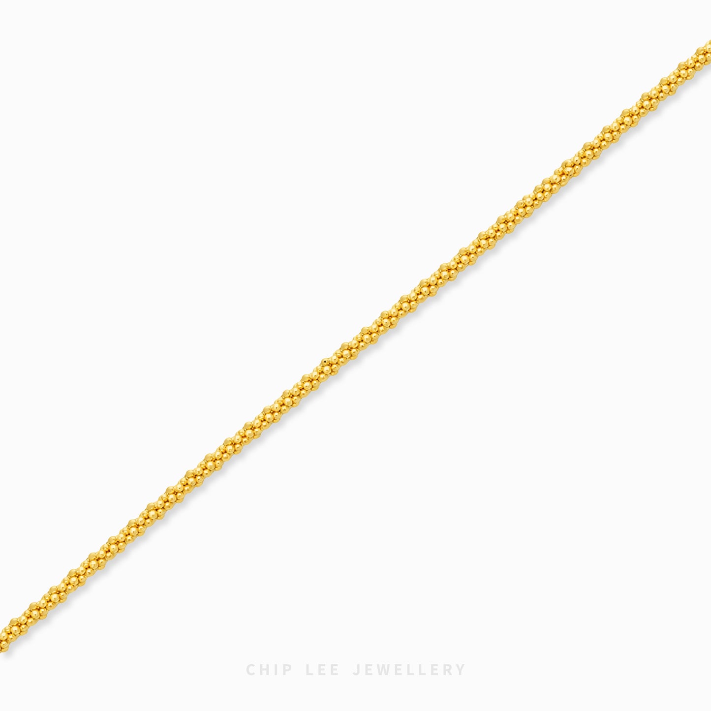 Elodie Fine Bracelet with finely woven links and small rounded accents in a slender profile