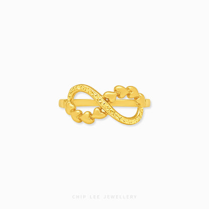 A gold infinity ring featuring a series of small heart links, displayed on a clean white background with the brand name 'CHIP LEE JEWELLERY' printed at the bottom.