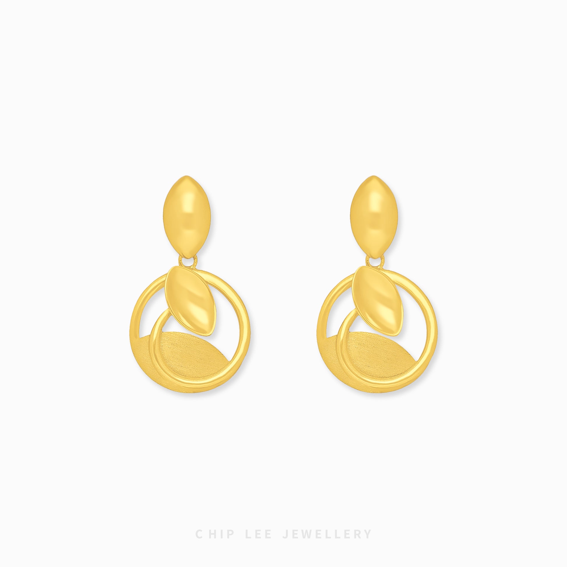 Chip Lee Jewellery Eterno Earring. Bold, chunky 916 Gold (22K) huggie hoops. Certified pure gold statement earrings from Singapore.