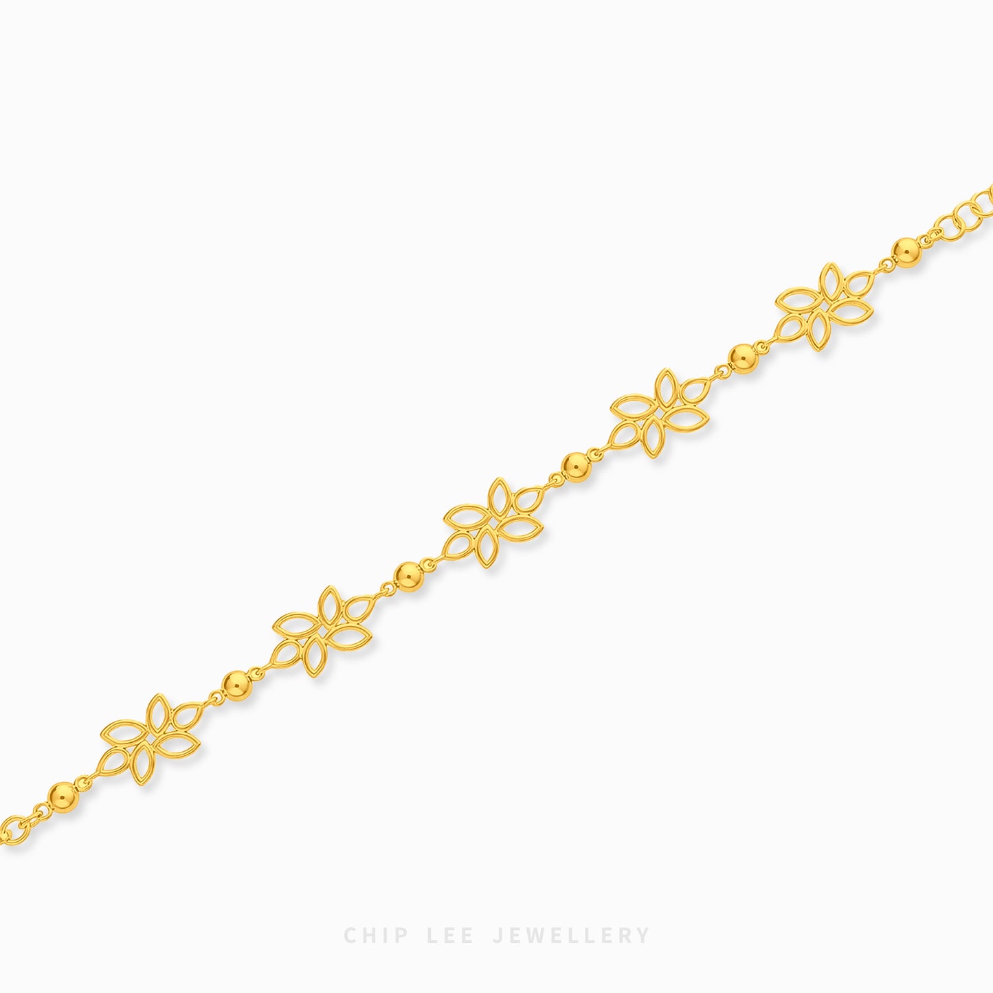 A delicate gold chain bracelet with repeating openwork flower motifs and small bead links, shown diagonally on a clean white background. The brand name 'CHIP LEE JEWELLERY' is printed at the bottom center.