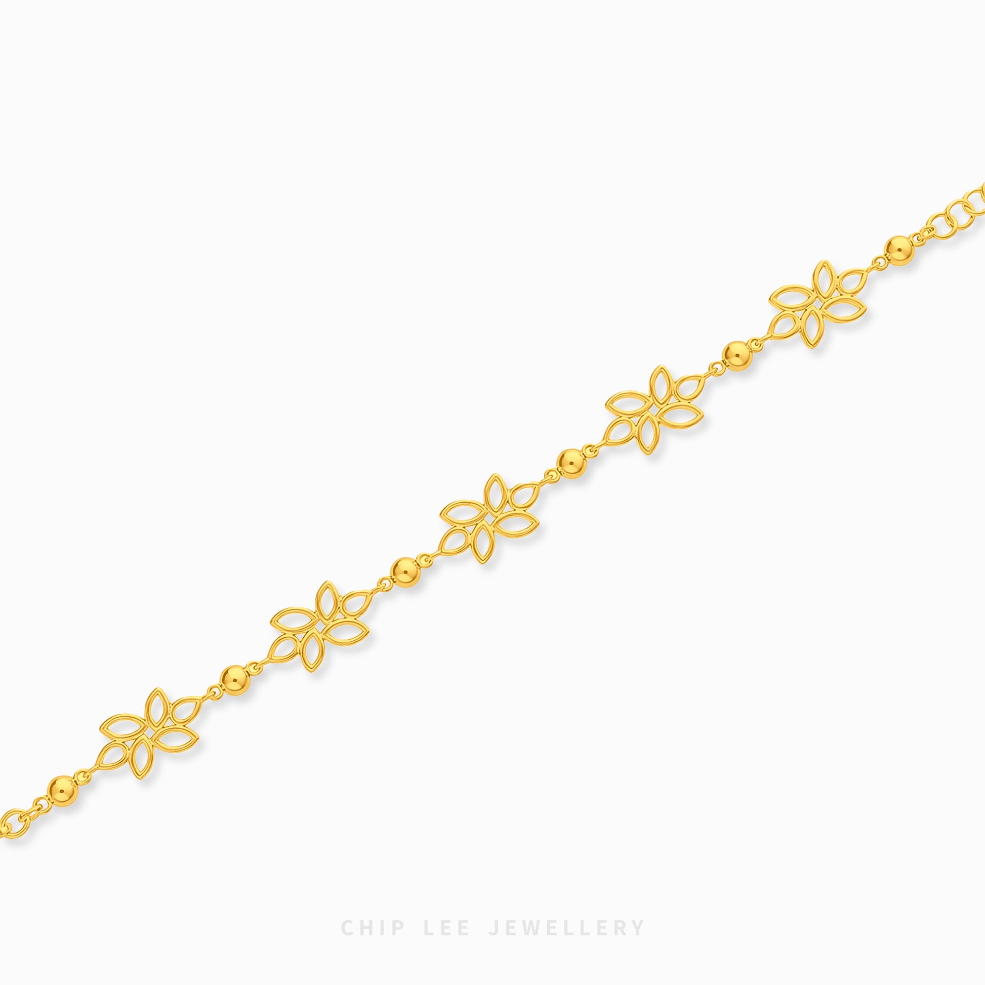 A delicate gold chain bracelet with repeating openwork flower motifs and small bead links, shown diagonally on a clean white background. The brand name 'CHIP LEE JEWELLERY' is printed at the bottom center.