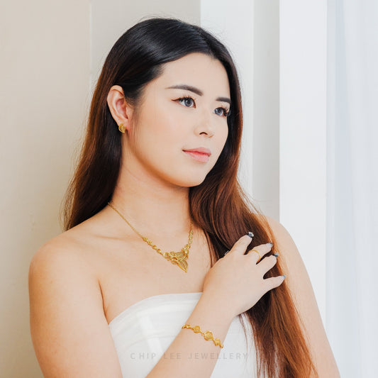 Chip Lee Jewellery Flora Set. Intricate 916 Gold (22K) leaf and petal flower set. Certified pure gold nature-inspired jewelry SG.