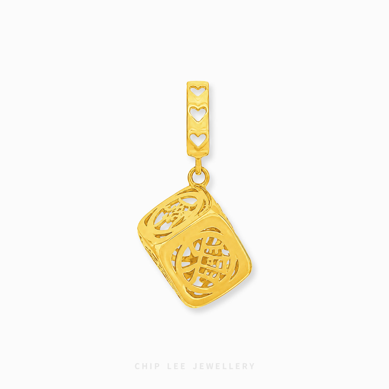 A gold-colored square charm pendant with intricate filigree cutouts and a matching rectangular connector bar featuring three heart-shaped cutouts, shown on a light gray background.