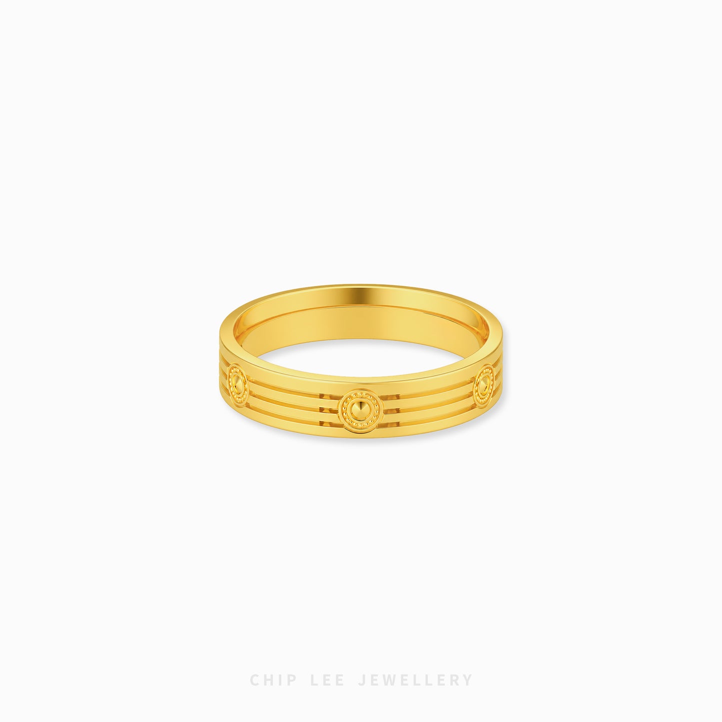 A gold band ring with a textured, ridged outer surface and circular medallion details, shown on a clean white background with 'CHIP LEE JEWELLERY' text at the bottom.