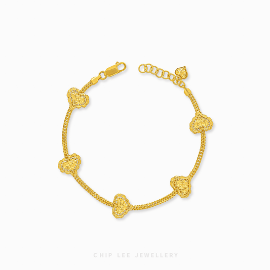 Heart Charm Bracelet in 916 gold. Subtle, symbolic heart design perfect for stacking or a timeless statement.