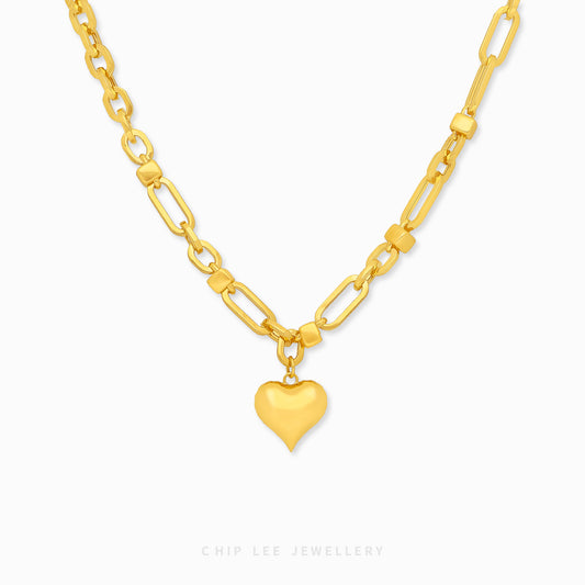 Chip Lee Jewellery Heart Charm Link Necklace. Heavyweight 916 Gold (22K) chain with romantic heart charm pendant. Certified pure gold statement jewellery SG.