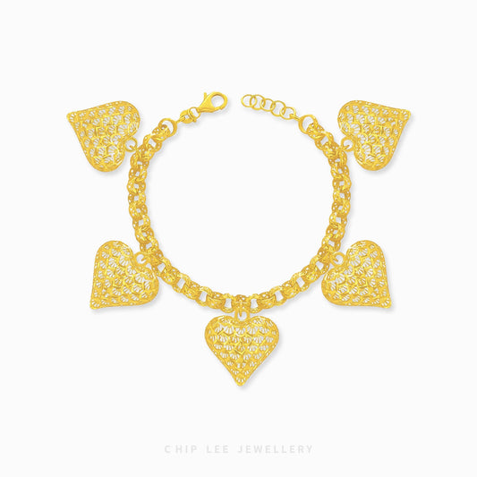 Heart Detailed Charms Statement Bracelet, certified 916 gold 22K from Chip Lee Jewellery Singapore – seven heart charms, luxury design.