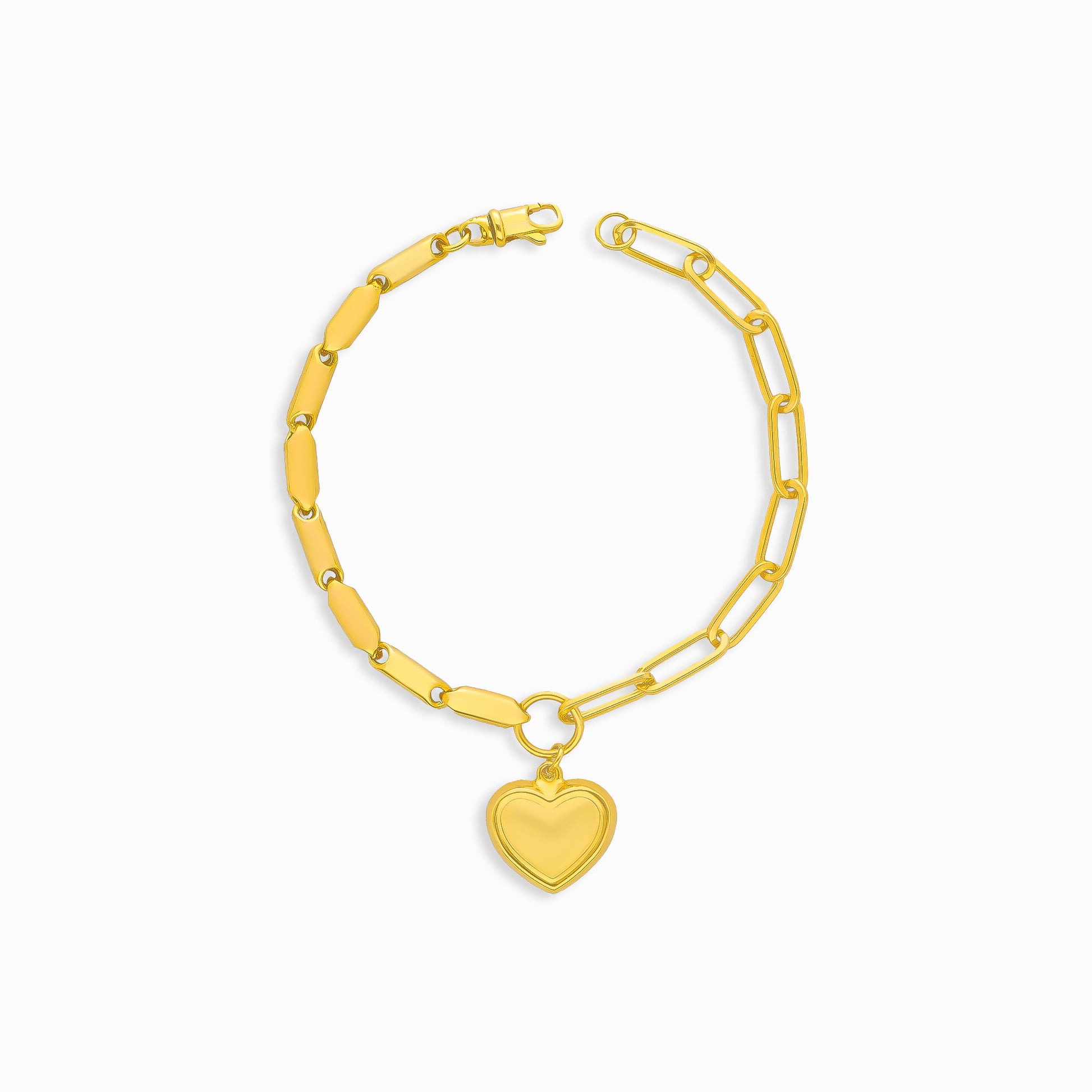 Gold bracelet with a heart-shaped charm on a white background