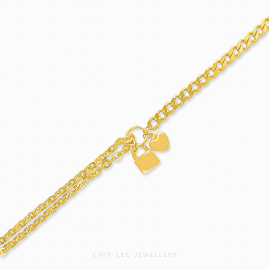 Heart and Lock Charm Bracelet in 916 gold