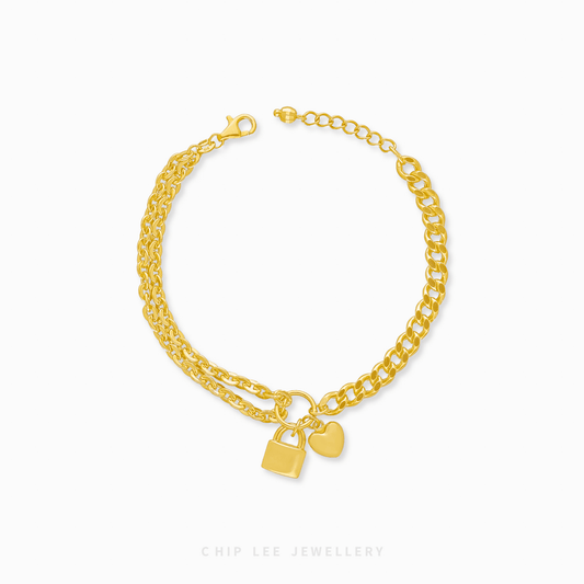 Heart and Lock Charm Bracelet in 916 gold