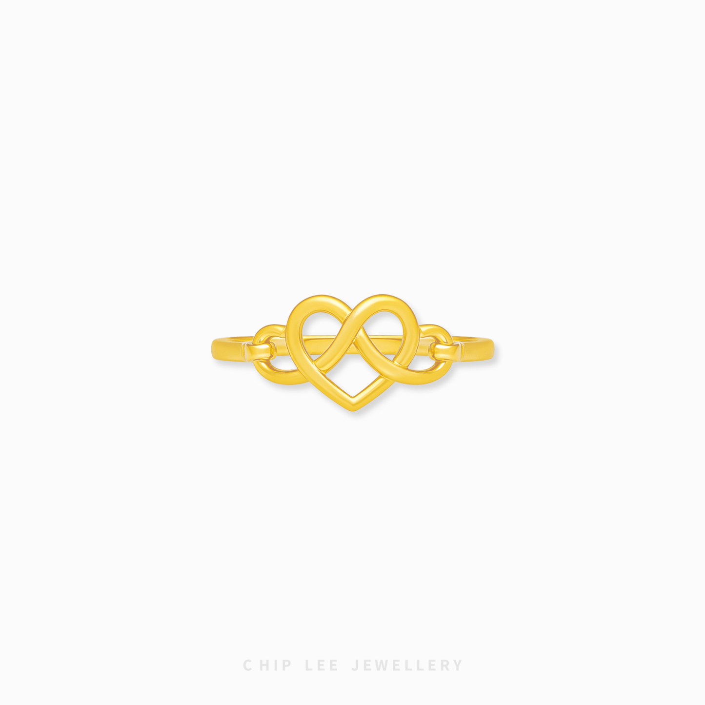 Infinity Heart Ring with intertwined heart design, smooth polished finish, comfortable fit, romantic women’s jewelry for everyday wear