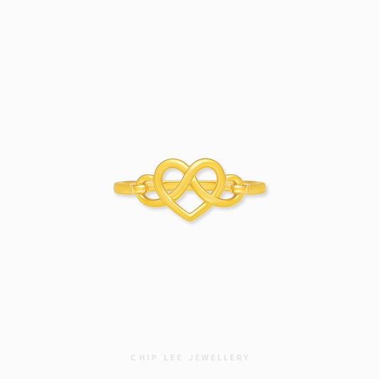 Infinity Heart Ring with intertwined heart design, smooth polished finish, comfortable fit, romantic women’s jewelry for everyday wear