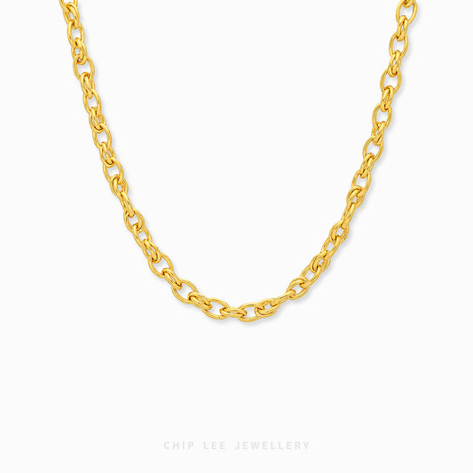 A gold chain necklace with a polished finish, shown draped in a U-shape against a clean white background. The brand name 'CHIP LEE JEWELLERY' is subtly printed in light gray at the bottom center.
