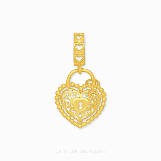 Intricate Heart Lock and Key Charm 916 gold by Chip Lee Jewellery Singapore, symbolising love and commitment, perfect for meaningful gifts.