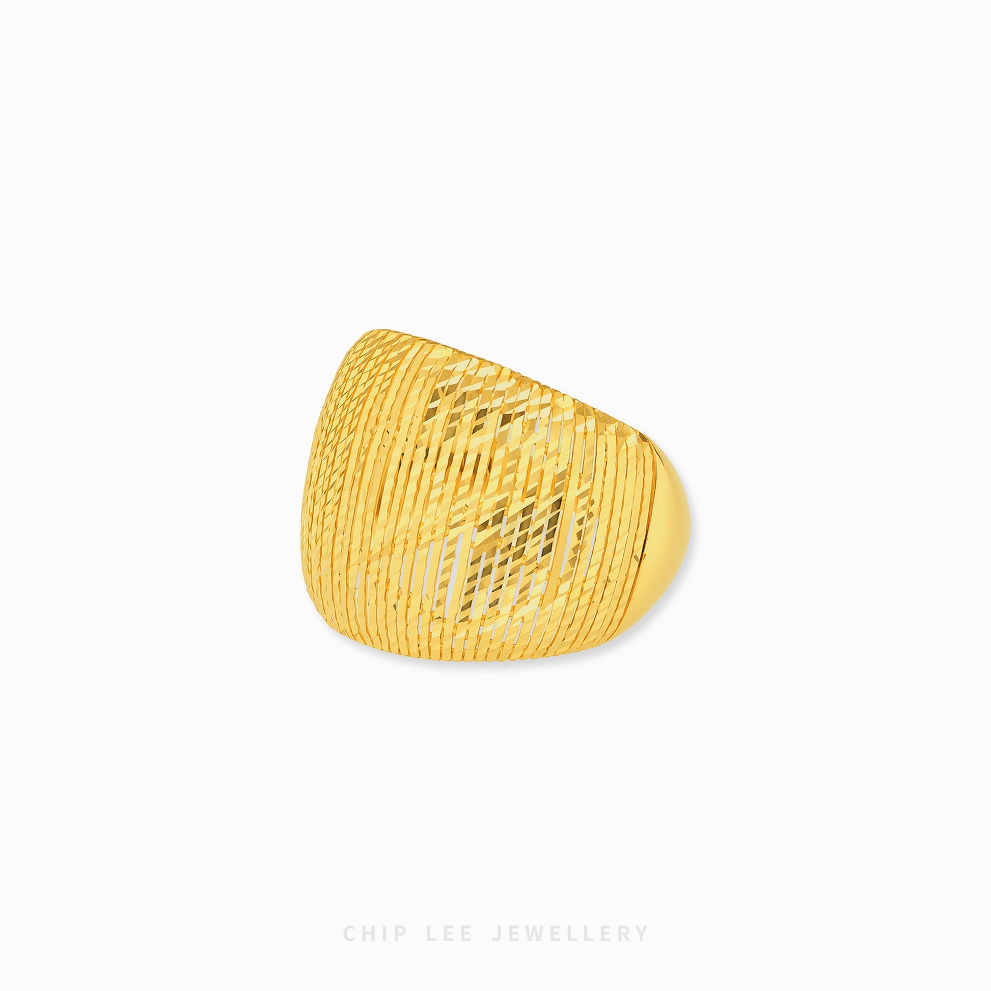 A chunky gold ring with a textured, ribbed basketweave pattern, shown on a clean white background with a subtle drop shadow.