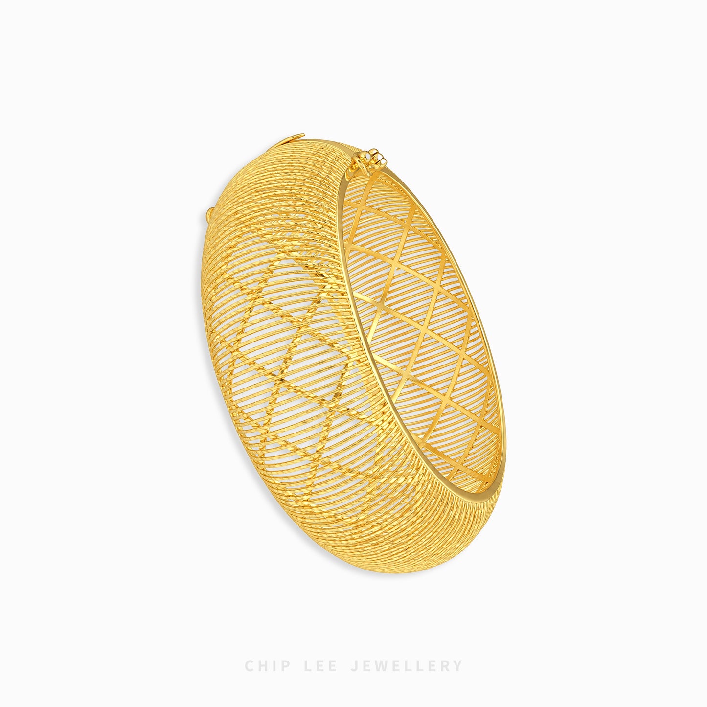 A gold-toned open bangle bracelet with a geometric diamond-patterned wire mesh design, shown on a clean white background with a Chip Lee Jewellery watermark at the bottom.