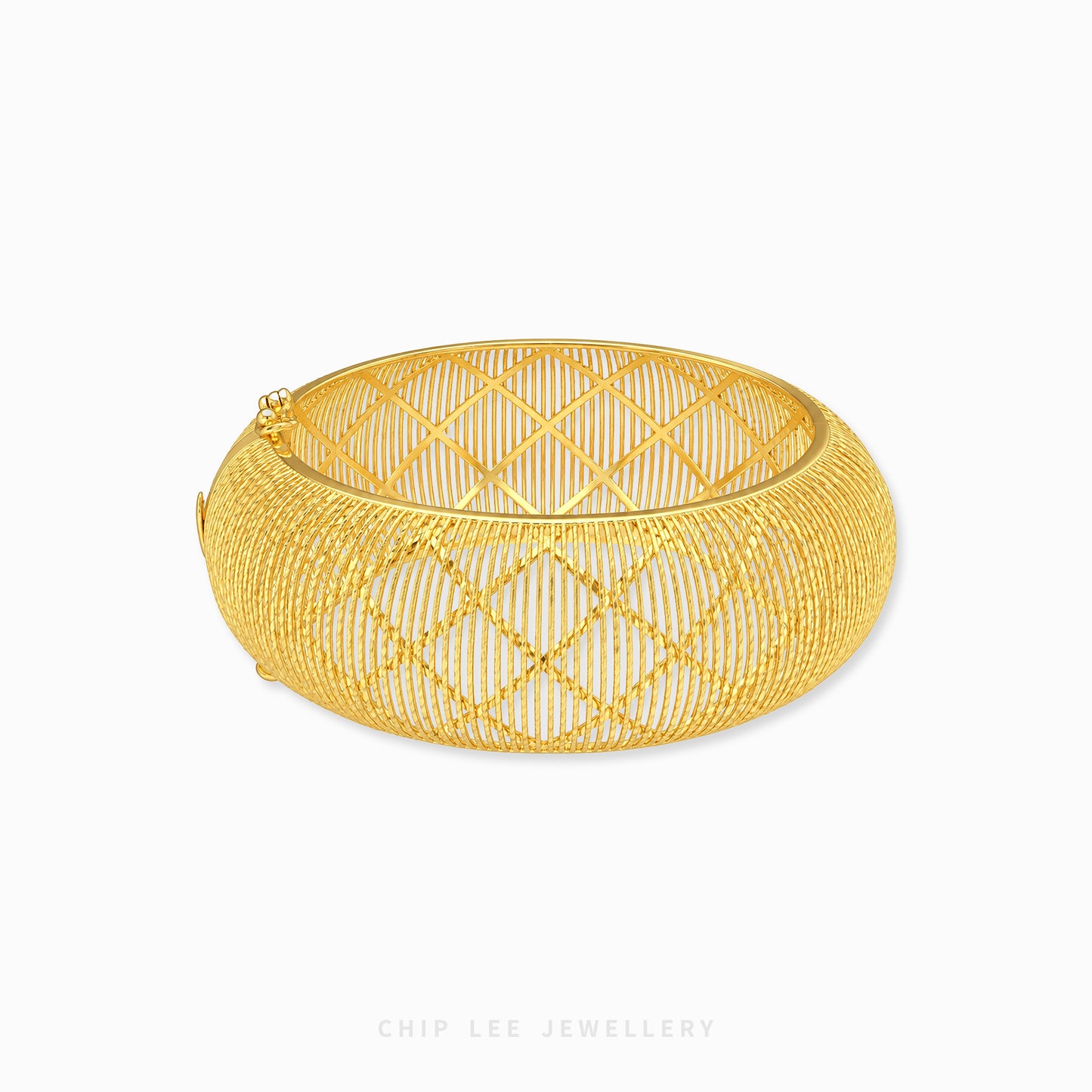 A gold-toned open bangle bracelet with a geometric diamond-patterned wire mesh design, shown on a clean white background with a Chip Lee Jewellery watermark at the bottom.