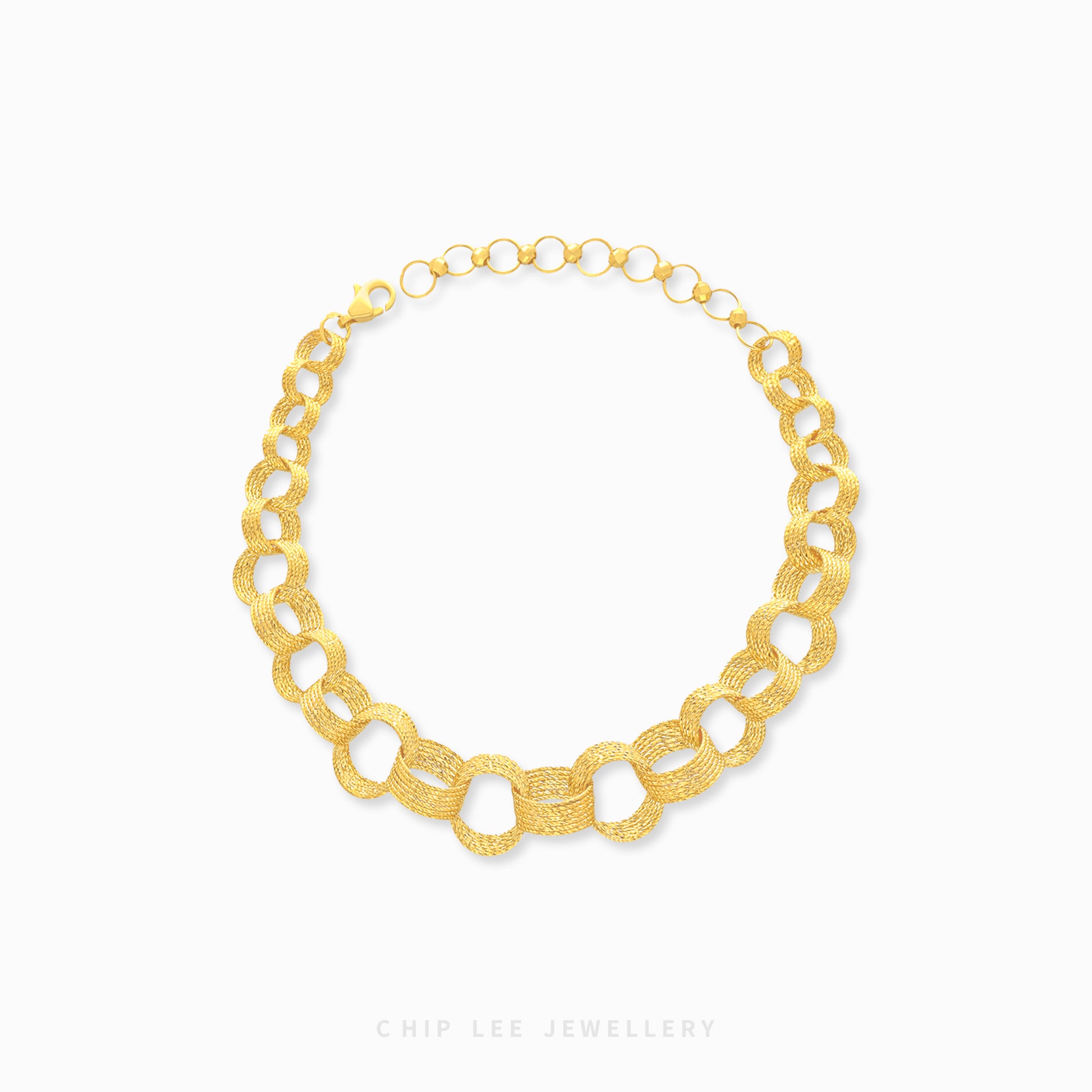 A gold bracelet with a chain link design.