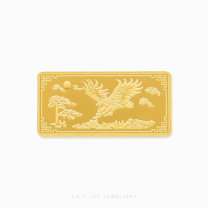 Gold bar with engraved design of a bird and landscape on a white background, branded 'Chip Lee Jewellery'.