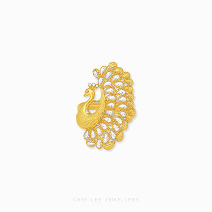 A gold-toned peacock brooch with clear pavé-set stones, displayed on a clean white background with the brand name 'CHIP LEE JEWELLERY' printed at the bottom.