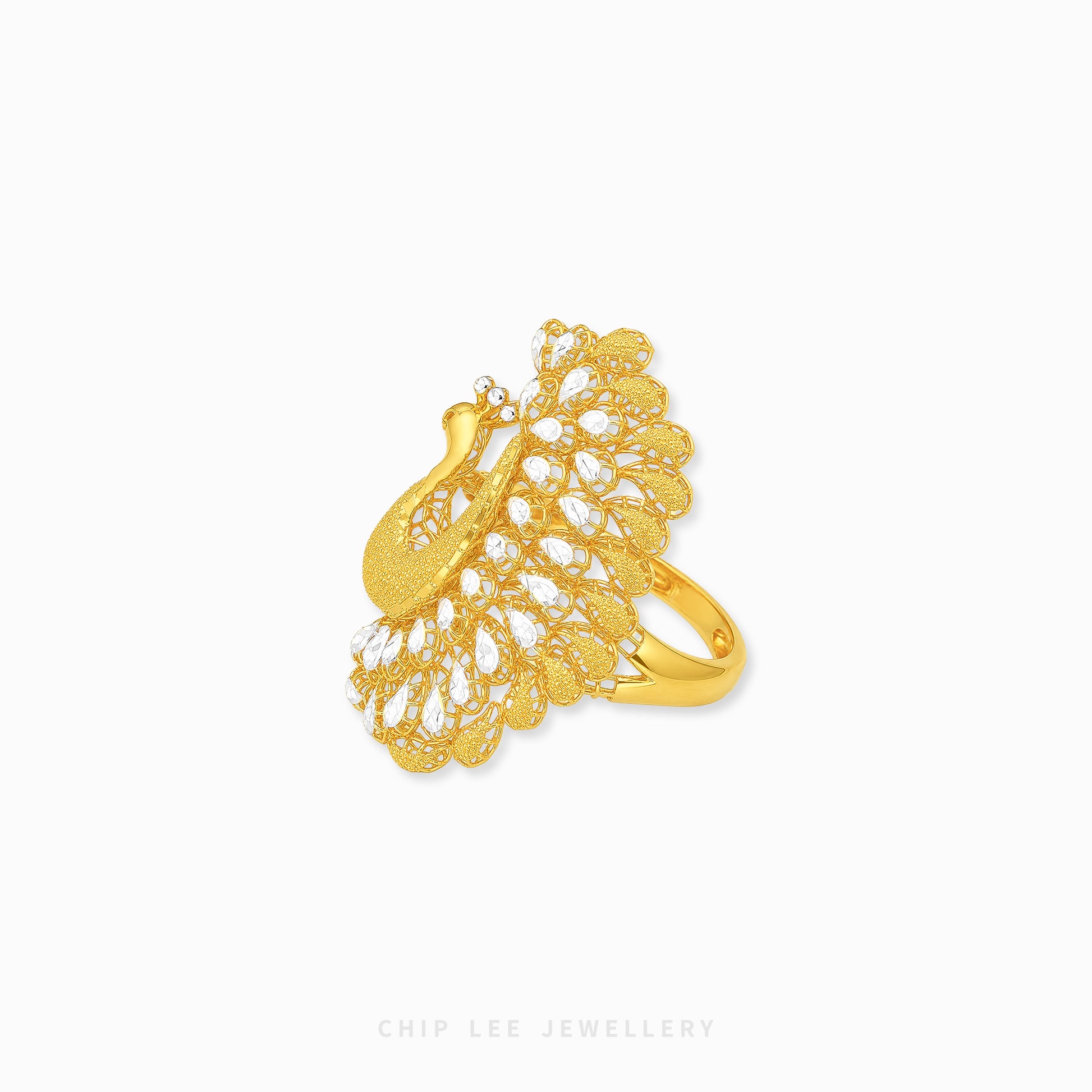 A gold-toned peacock brooch with clear pavé-set stones, displayed on a clean white background with the brand name 'CHIP LEE JEWELLERY' printed at the bottom.