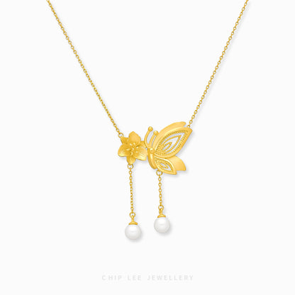 999 Pure Gold Floral Butterfly Pearl Necklace with delicate motifs and a pearl, crafted in solid gold for timeless elegance and charm.
