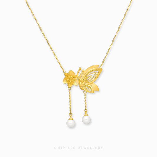 999 Pure Gold Floral Butterfly Pearl Necklace with delicate motifs and a pearl, crafted in solid gold for timeless elegance and charm.