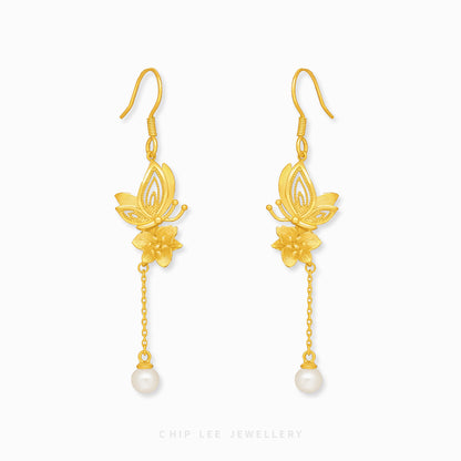 999 Pure Gold Floral Butterfly Pearl Earrings with delicate floral and butterfly designs, accented by pearls, crafted in solid gold for timeless elegance.