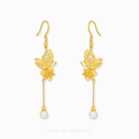 999 Pure Gold Floral Butterfly Pearl Earrings with delicate floral and butterfly designs, accented by pearls, crafted in solid gold for timeless elegance.