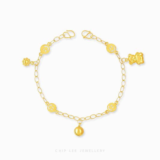 Mixed Charm Baby Anklet 4 with flower, bell, bear, and smiley face charms in 916 gold by Chip Lee Jewellery Singapore
