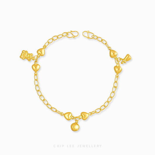 Mixed Charm Baby Anklet 6 with milk bottle, bear, and bell charms in 916 gold by Chip Lee Jewellery Singapore
