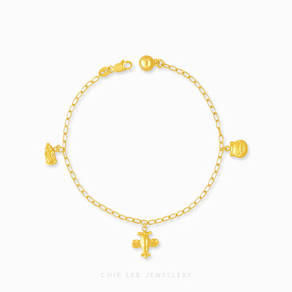 Mixed Charm Baby Anklet 7 with milk bottle, plane, lucky cat, and bell charms in 916 gold by Chip Lee Jewellery Singapore