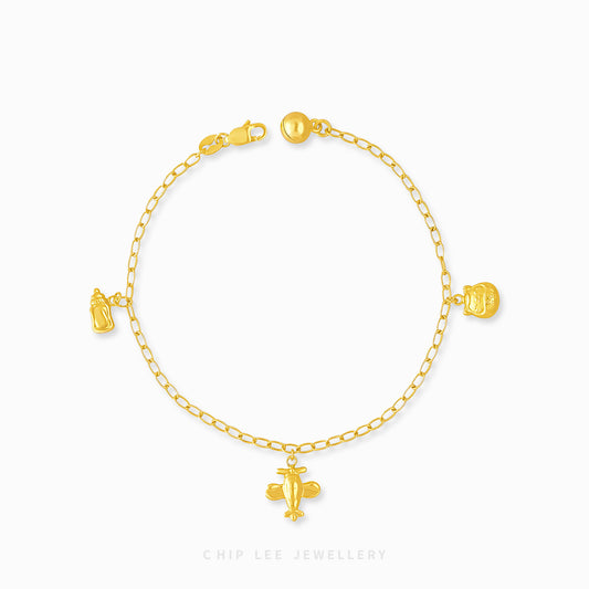 Mixed Charm Baby Anklet 7 with milk bottle, plane, lucky cat, and bell charms in 916 gold by Chip Lee Jewellery Singapore