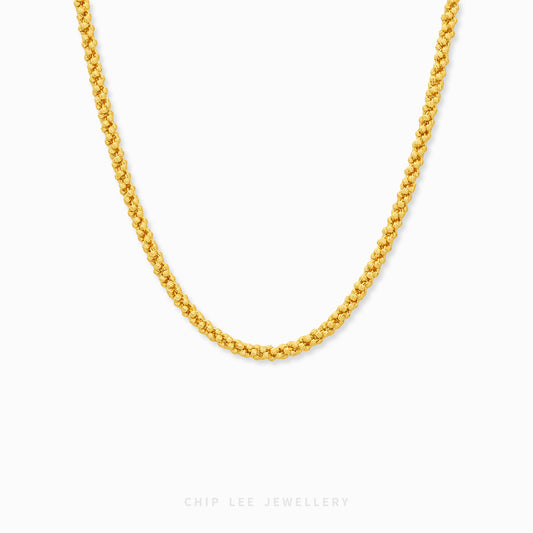 Odette Necklace featuring closely interlocking textured nugget links in a continuous sculpted chain design.
Copy