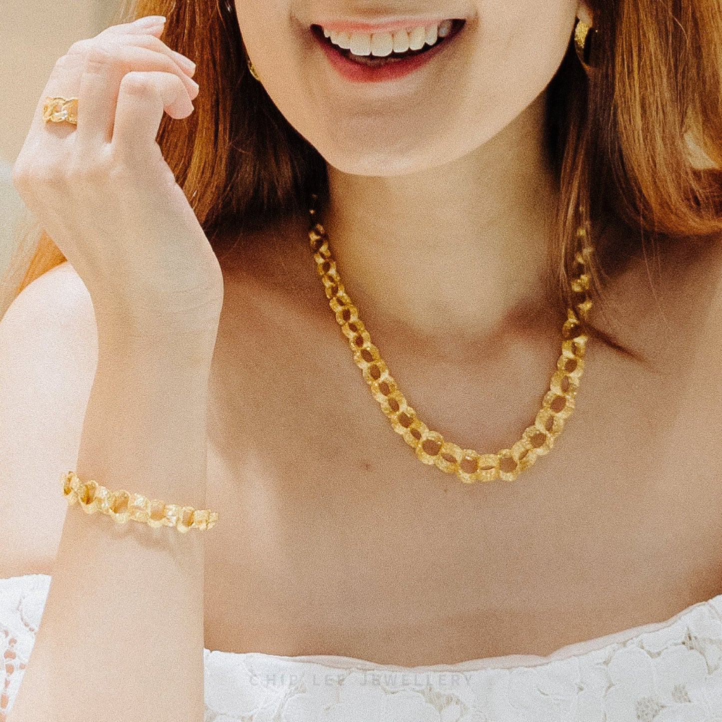 Oriana Jewellery Set with bold interlocking links in 916 gold by Chip Lee Jewellery Singapore