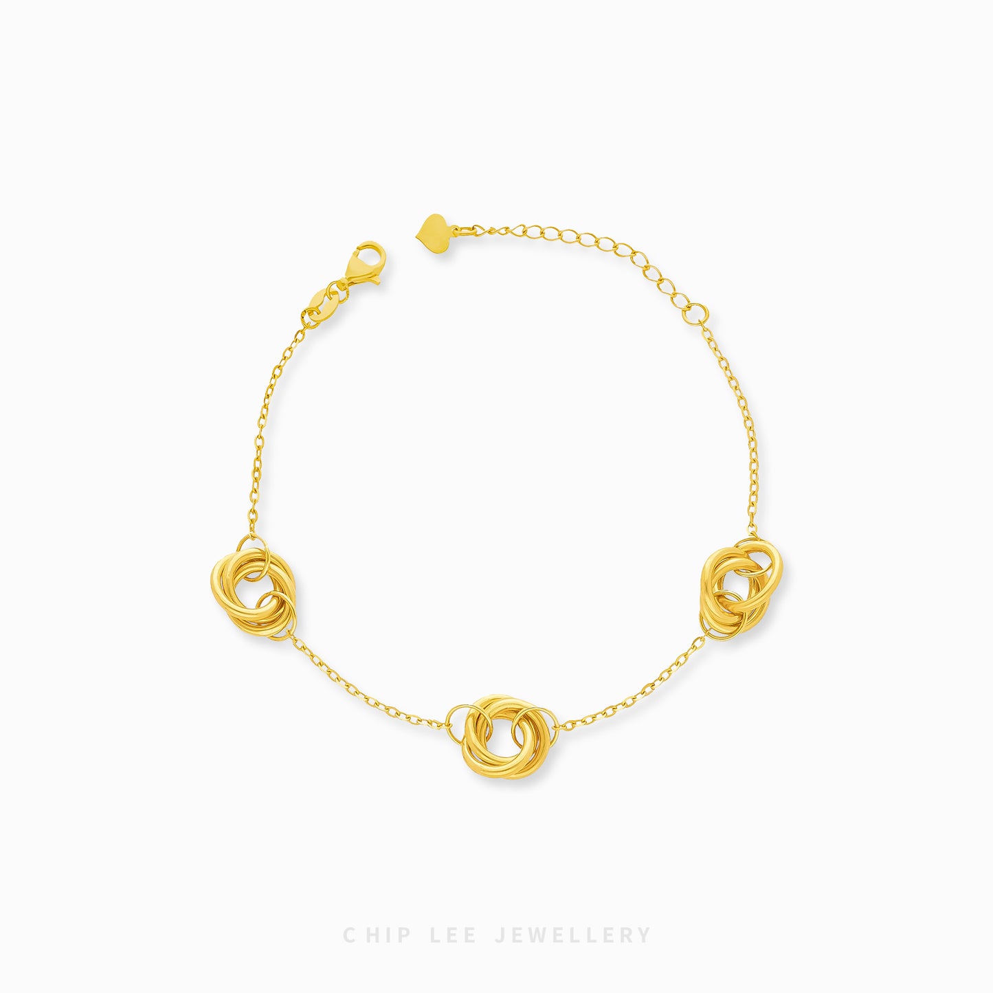 A gold bracelet featuring a series of trinity loop designs on a chain-link band with a clasp.