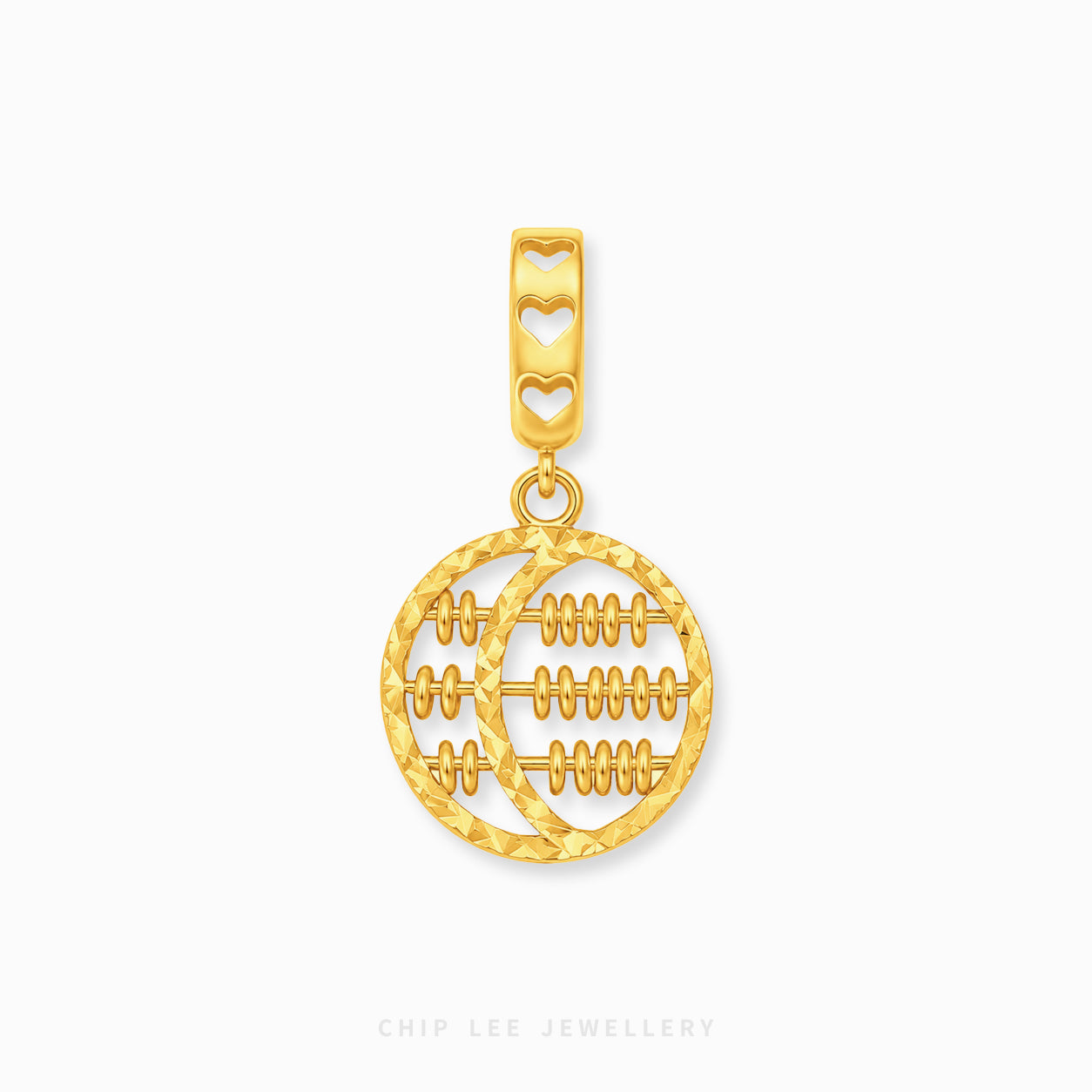 A gold pendant charm featuring a circular design with horizontal lines resembling a traditional abacus, suspended from a bail decorated with three heart cutouts, shown on a light gray background.
