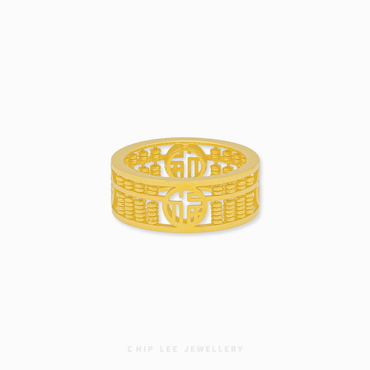 916 Gold Abacus Ring featuring a traditional rectangular frame with functional moving gold beads for a tactile luxury feel.